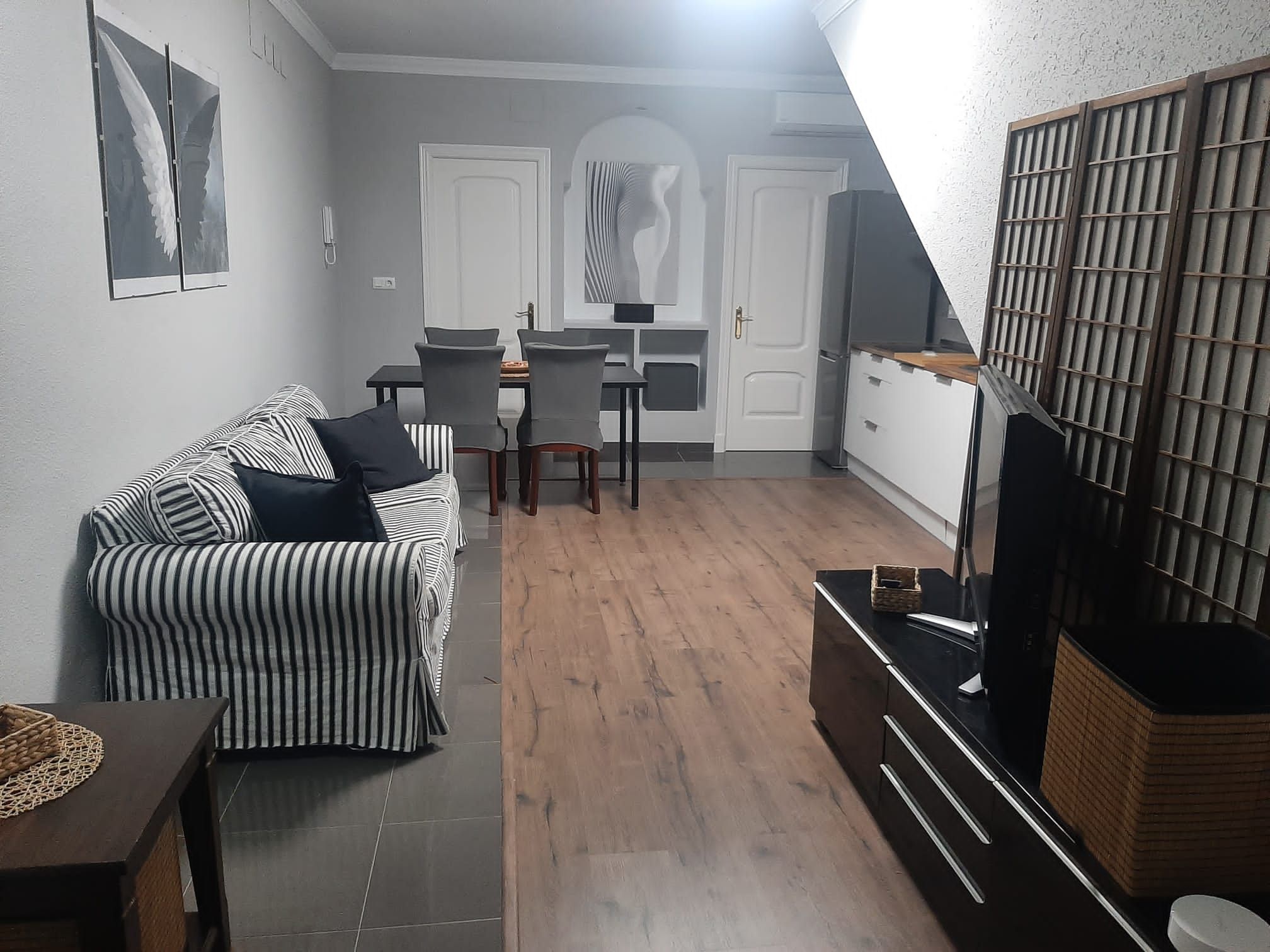 Living room of Flat to rent in Villaverde del Río  with Air Conditioner, Parquet flooring and Furnished
