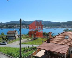 Vista exterior de Casa o xalet en venda en Cangas  amb Terrassa, Traster i Moblat