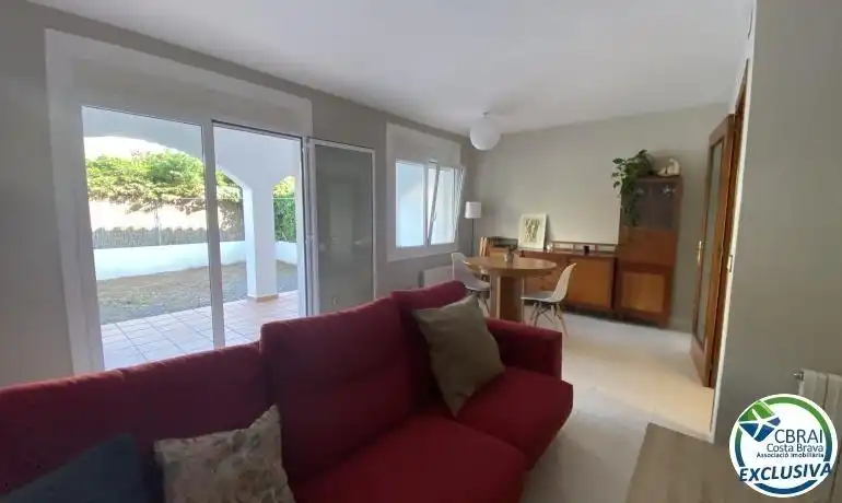 Sala d'estar de Casa o xalet en venda en Roses amb Calefacció, Jardí privat i Terrassa