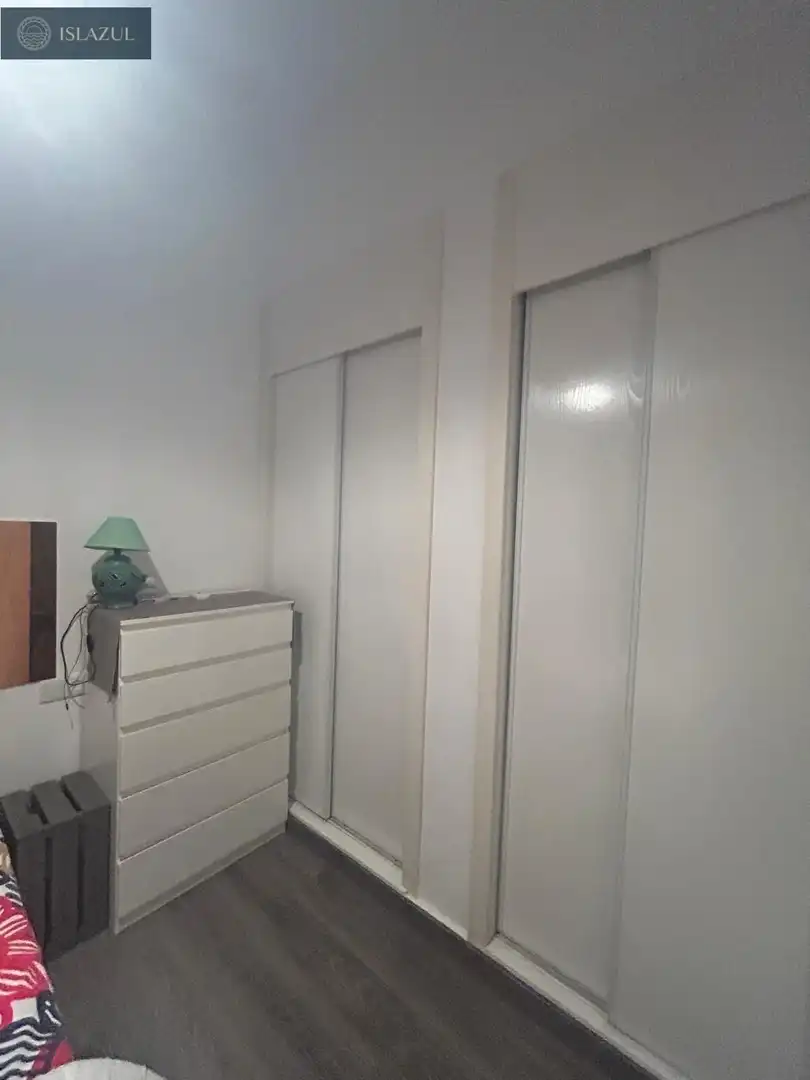Dormitori de Apartament en venda en Isla Cristina amb Aire condicionat, Jardí privat i Terrassa