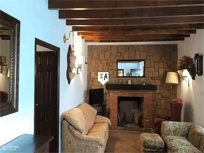 Sala d'estar de Casa adosada en venda en Alfarnatejo amb Terrassa i Traster