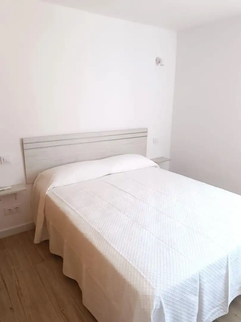 Dormitori de Apartament de lloguer en Sotogrande amb Aire condicionat