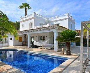 Vista exterior de Casa o xalet en venda en Santa Eulària des Riu amb Aire condicionat, Jardí privat i Terrassa