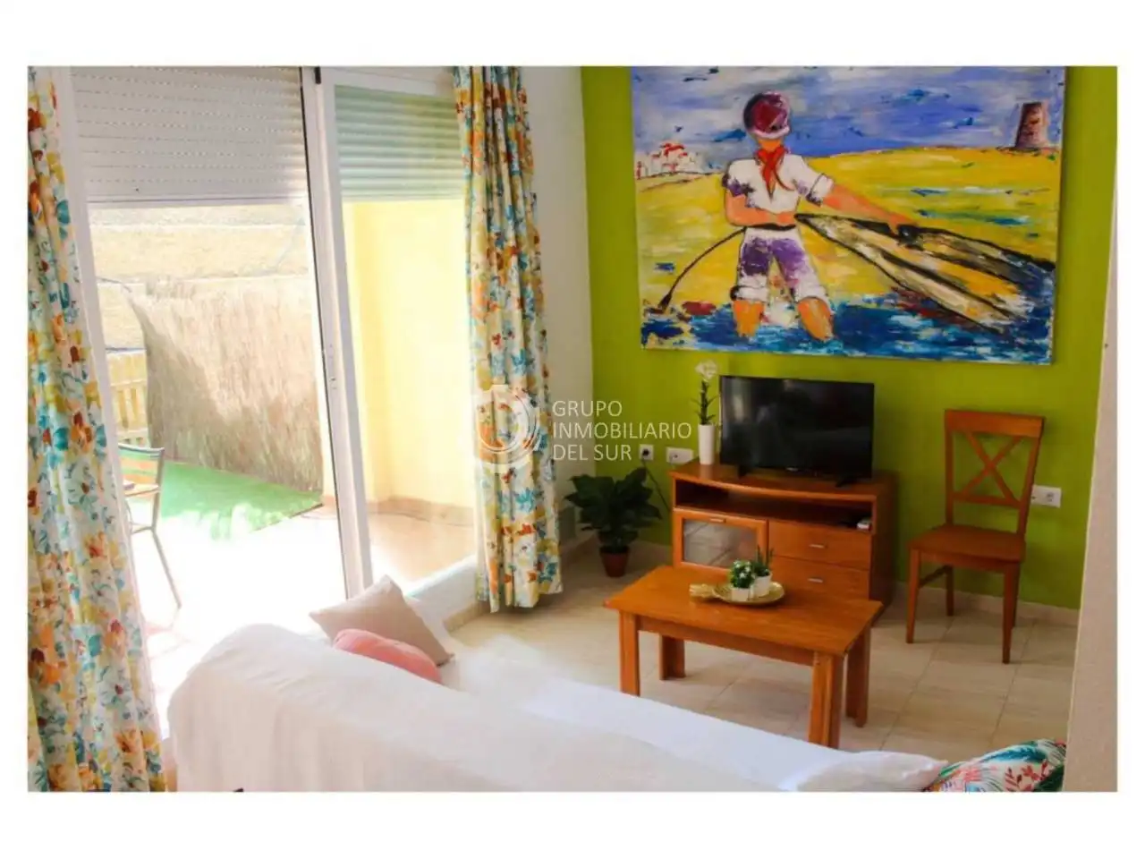 Sala de estar de Dúplex de alquiler en Barbate con Aire acondicionado, Jardín privado y Amueblado