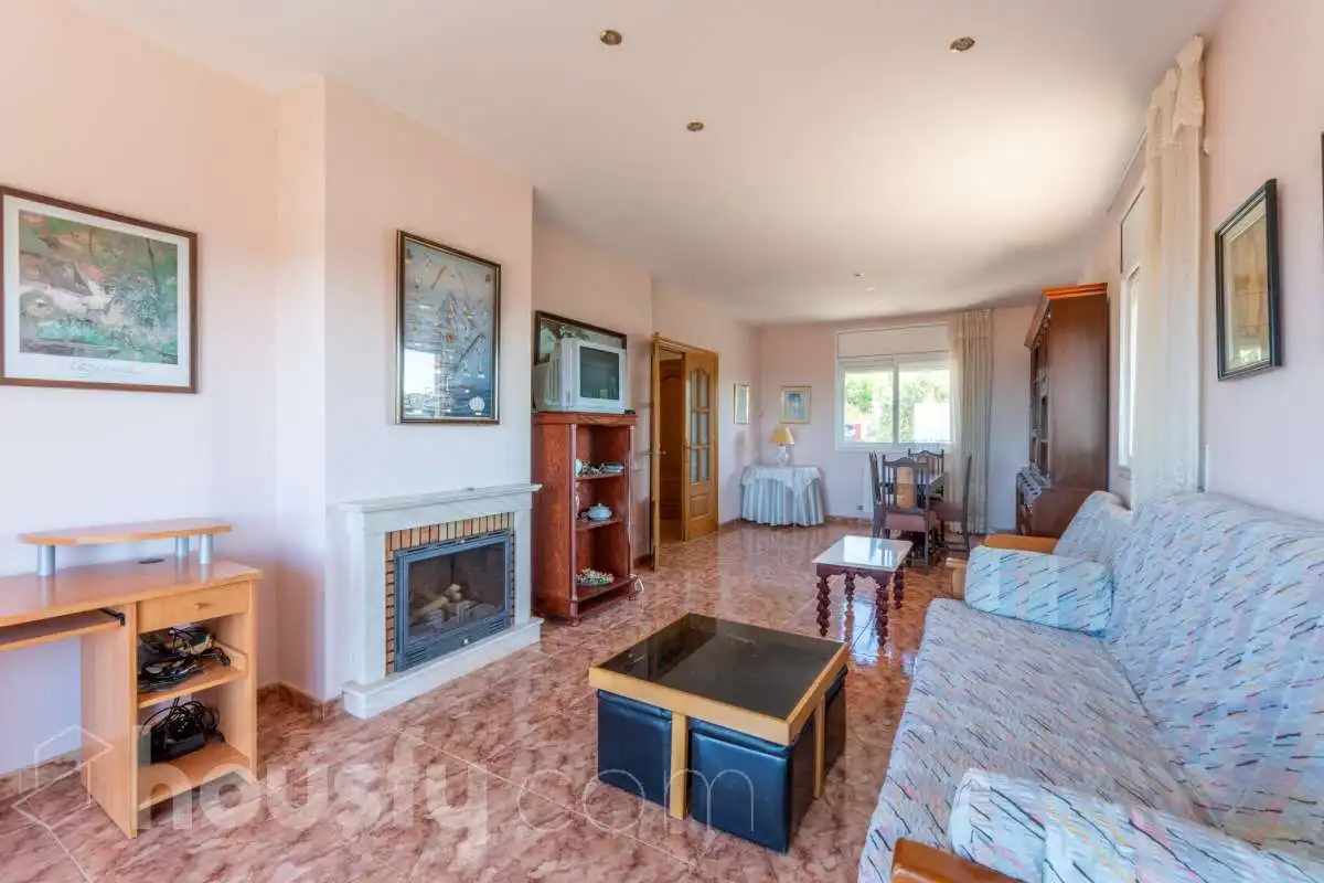 Sala de estar de Casa o chalet en venta en Cunit con Calefacción, Jardín privado y Terraza