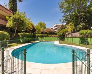 Swimming pool of Flat for sale in  Madrid Capital  with Air Conditioner, Terrace and Balcony