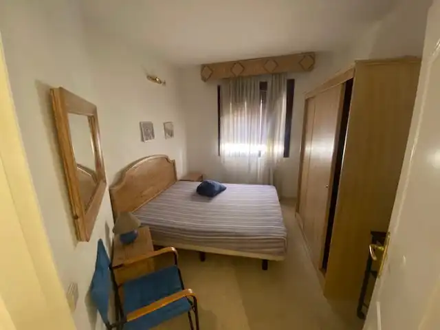Dormitori de Apartament de lloguer en Sevilla amb Aire condicionat, Moblat i Forn