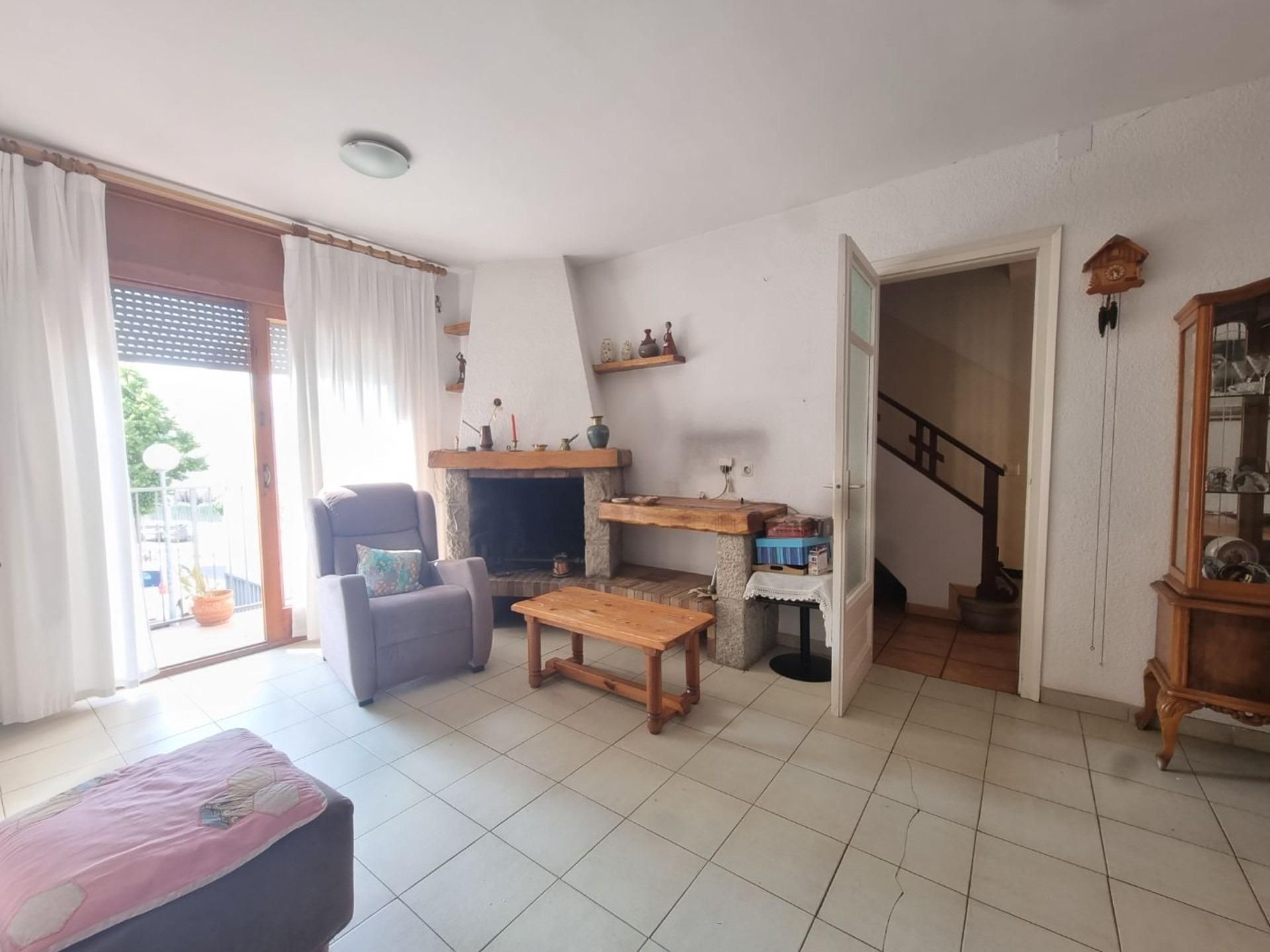 Sala d'estar de Casa o xalet en venda en Lloret de Mar amb Calefacció, Jardí privat i Terrassa