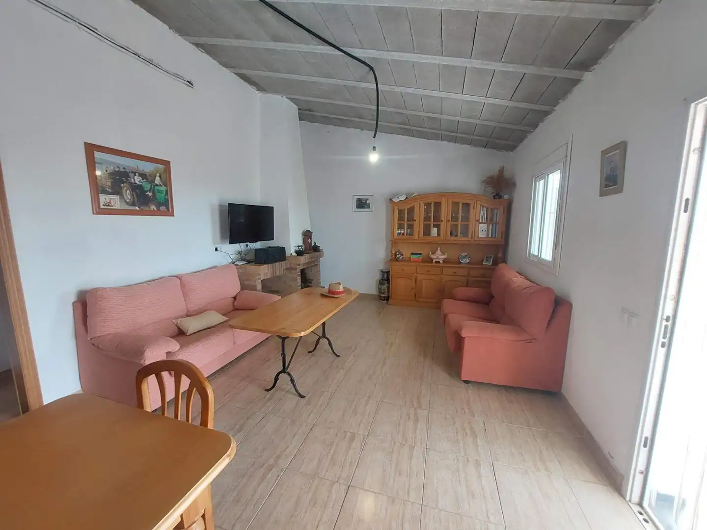 Sala d'estar de Finca rústica en venda en L'Ametlla de Mar  amb Terrassa i Moblat