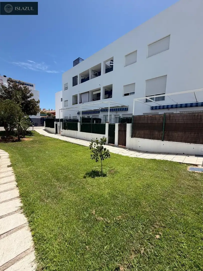 Außenansicht von Maisonette zum Verkauf in Islantilla mit Klimaanlage, Heizung und Privatgarten
