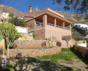 Vista exterior de Casa o xalet de lloguer en Roquetas de Mar amb Aire condicionat