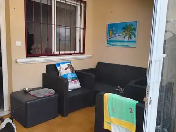 Sala d'estar de Casa adosada en venda en Orihuela amb Aire condicionat, Terrassa i Piscina