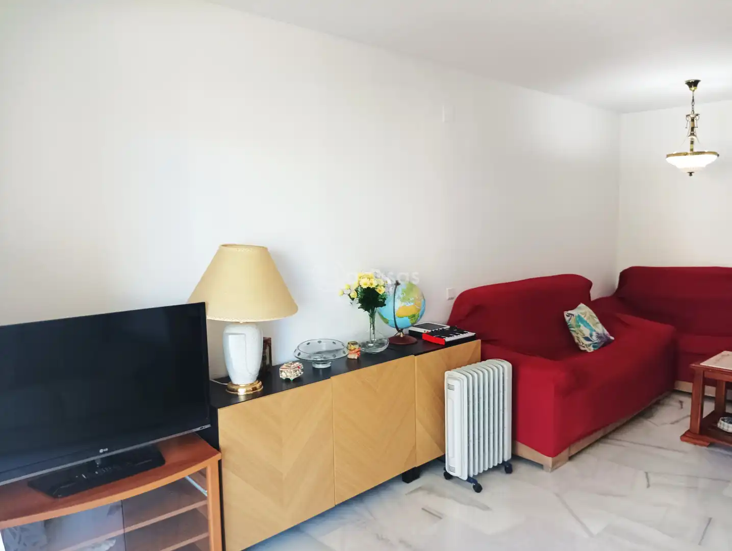 Sala de estar de Piso en venta en Benalmádena con Aire acondicionado, Terraza y Amueblado