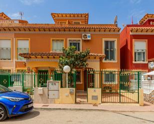 Exterior view of Single-family semi-detached for sale in Torrevieja  with Air Conditioner, Private garden and Community pool
