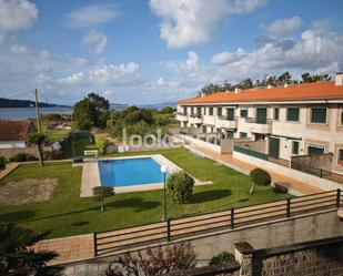 Exterior view of Flat for sale in Sanxenxo  with Parquet flooring, Storage room and Furnished