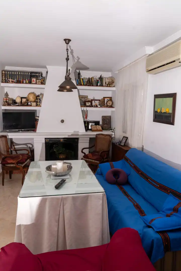 Sala de estar de Casa adosada en venta en Almonte con Terraza, Trastero y Balcón