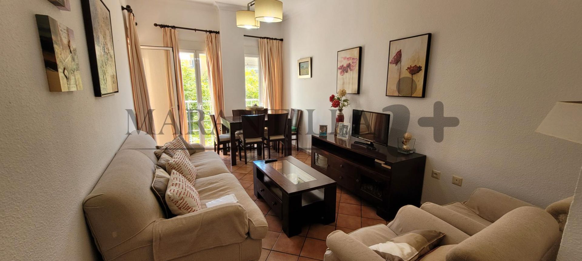 Sala de estar de Apartamento en venta en Islantilla con Terraza, Amueblado y Piscina comunitaria