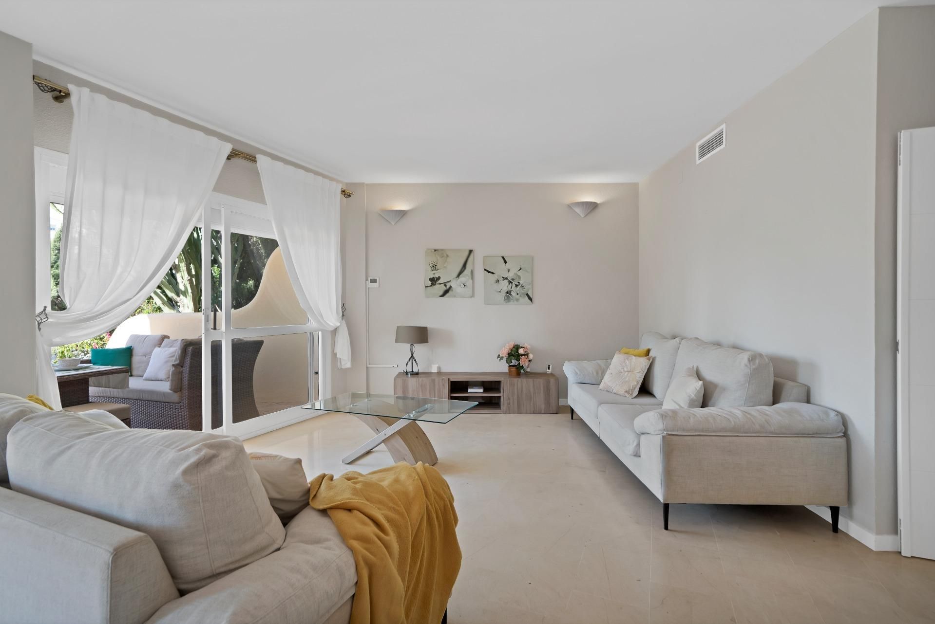 Living room of Planta baja for sale in Mijas  with Air Conditioner, Terrace and Community pool
