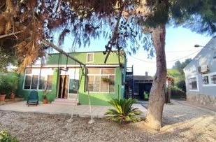 Vista exterior de Finca rústica en venda en Orihuela amb Aire condicionat, Calefacció i Jardí privat