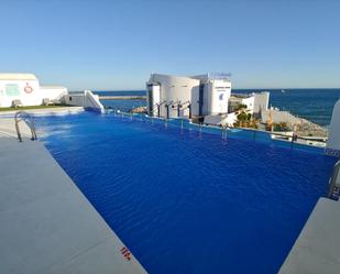 Swimming pool of Garage for sale in Benalmádena