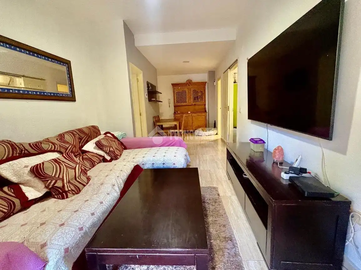 Sala d'estar de Pis en venda en Manilva amb Piscina comunitària