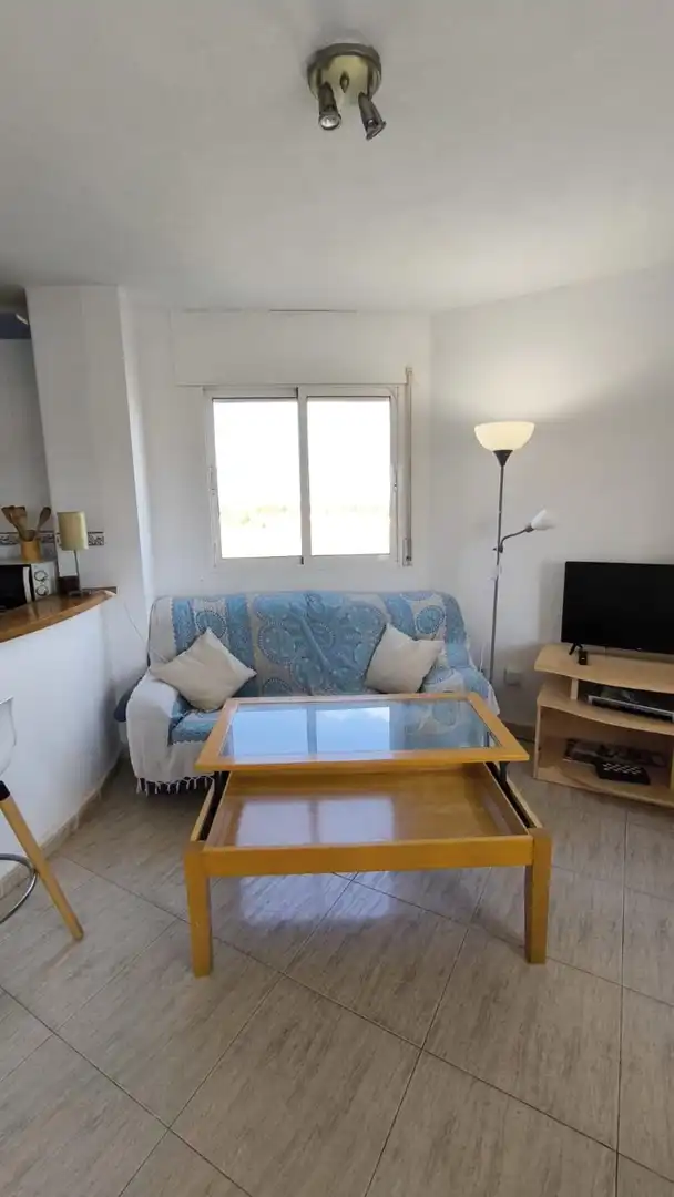 Sala d'estar de Apartament de lloguer en Cartagena amb Aire condicionat, Piscina i Moblat