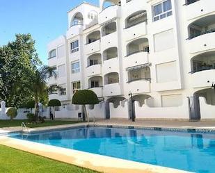 Swimming pool of Garage for sale in Benalmádena