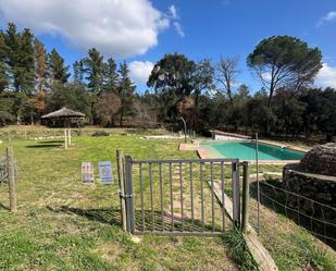 Piscina de Finca rústica de lloguer en Sant Feliu de Buixalleu amb Calefacció
