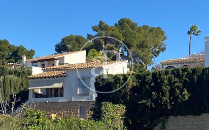 Vista exterior de Casa o xalet en venda en Moraira amb Calefacció, Jardí privat i Terrassa