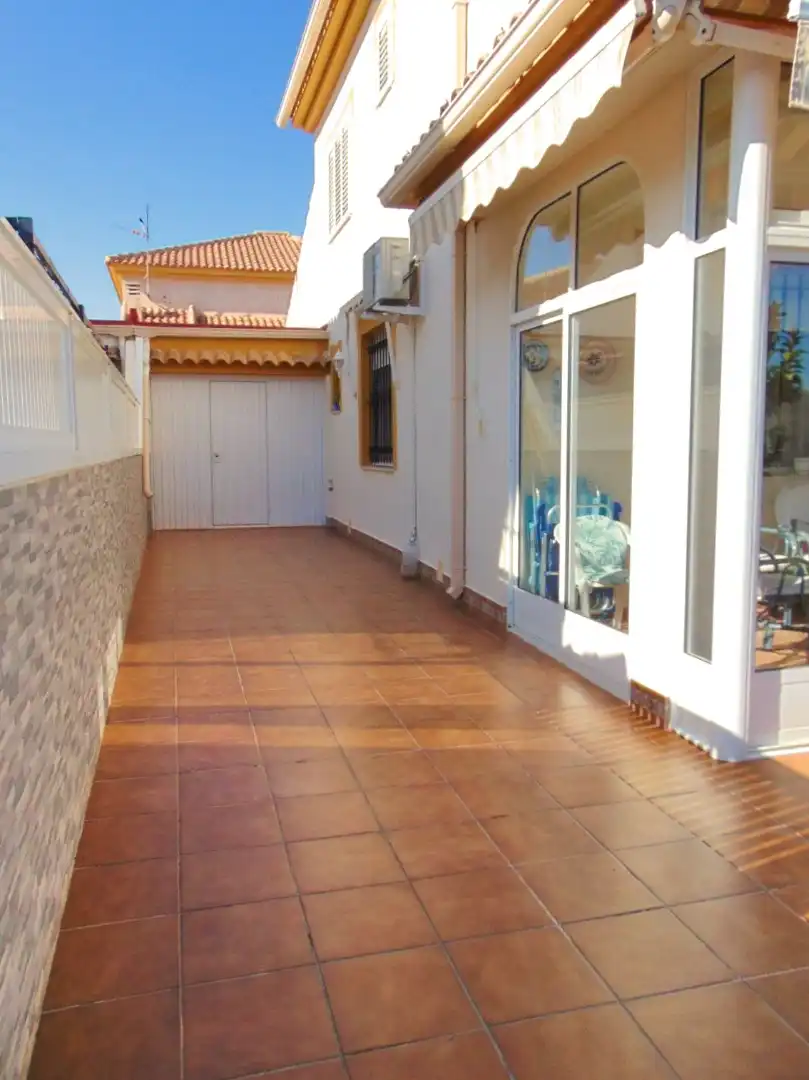 Terrassa de Casa adosada en venda en Pilar de la Horadada amb Aire condicionat, Calefacció i Jardí privat