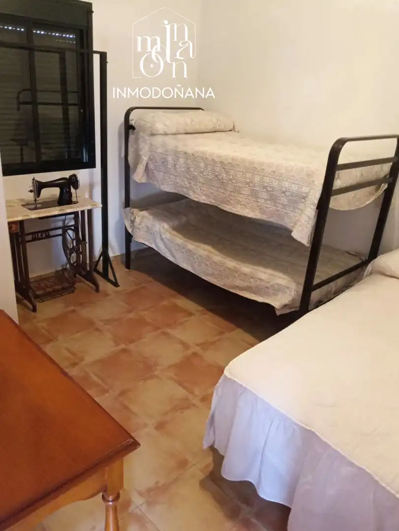 Habitación de Casa adosada en venta en Almonte con Terraza y Amueblado