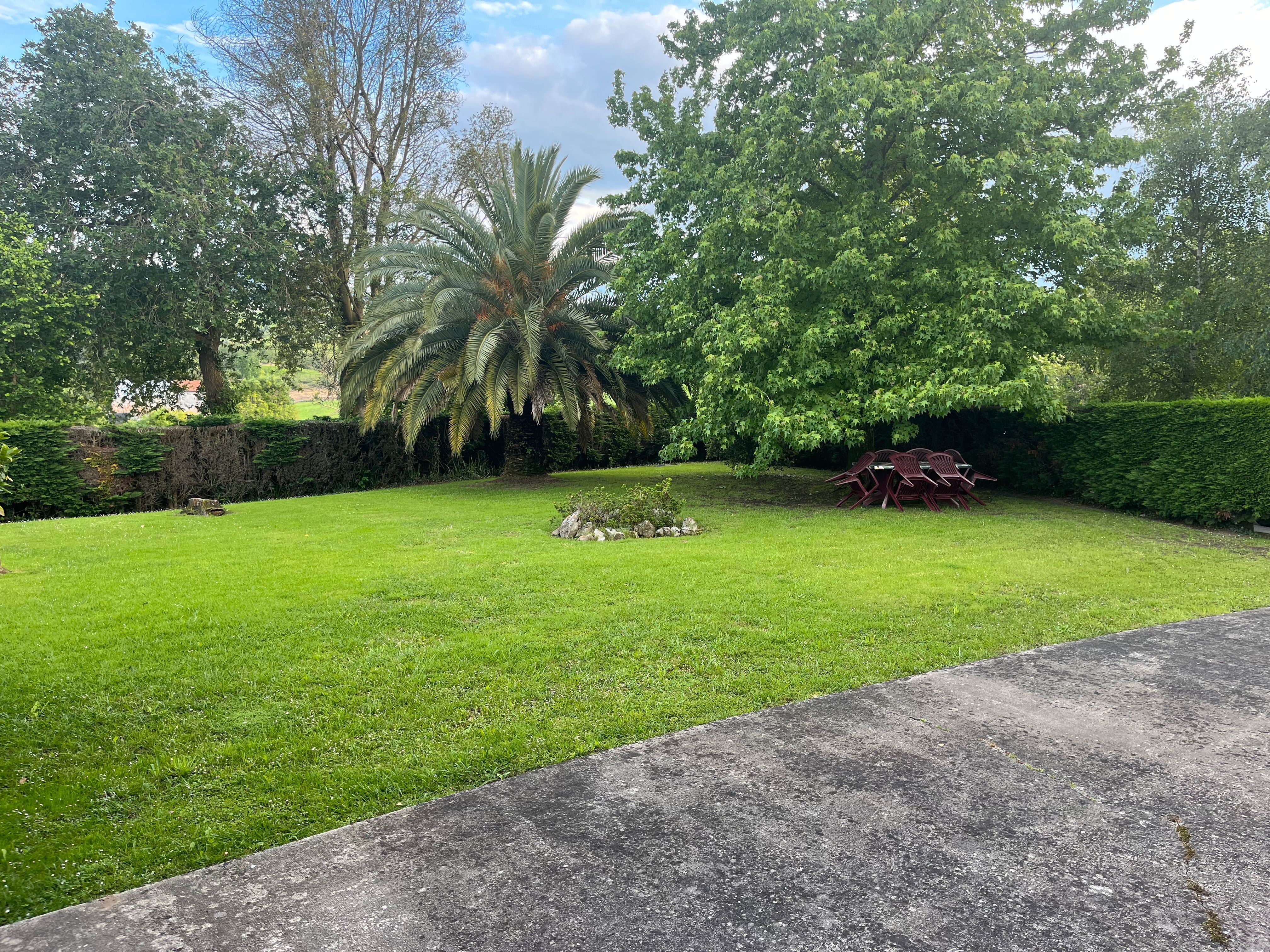 Jardí de Casa adosada en venda en Torrelavega  amb Jardí privat, Parquet i Terrassa
