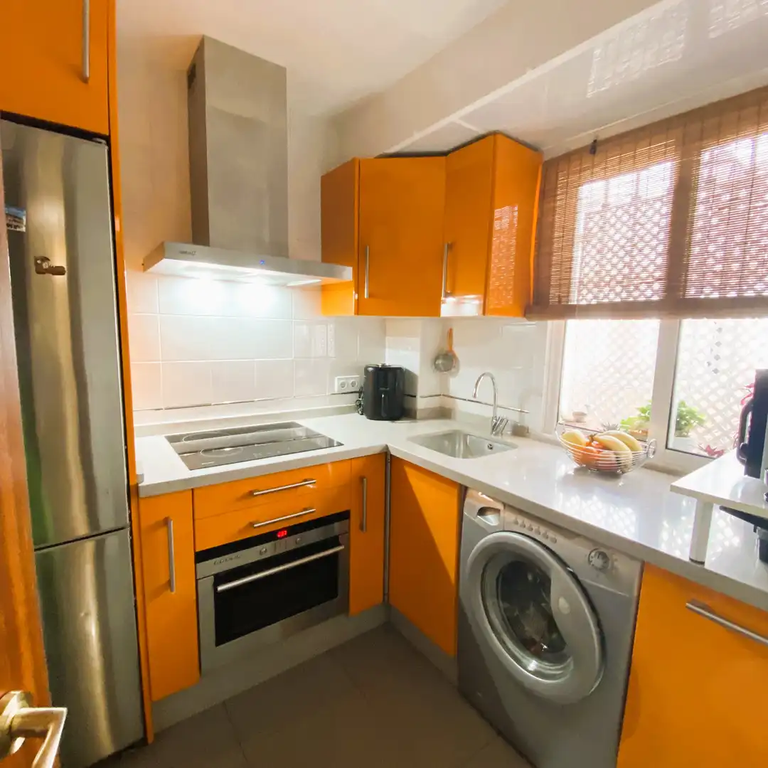 Cocina de Casa adosada en venta en Dos Hermanas con Aire acondicionado, Parquet y Trastero