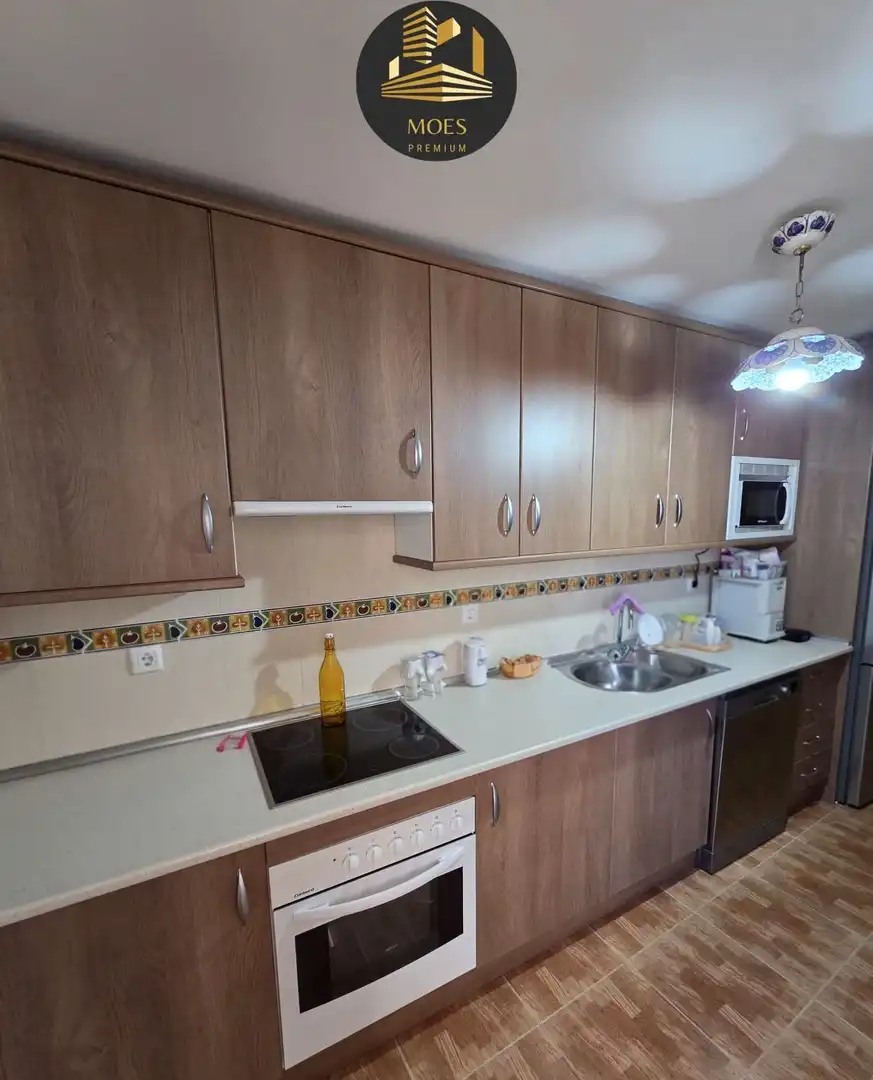 Kitchen of Flat for sale in Mengíbar  with Air Conditioner, Terrace and Storage room