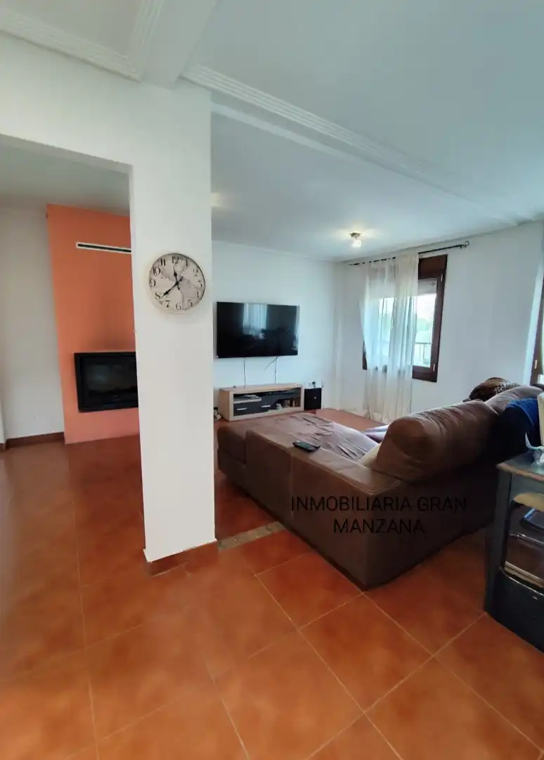 Sala de estar de Casa adosada en venta en Las Quintanillas con Calefacción, Jardín privado y Parquet