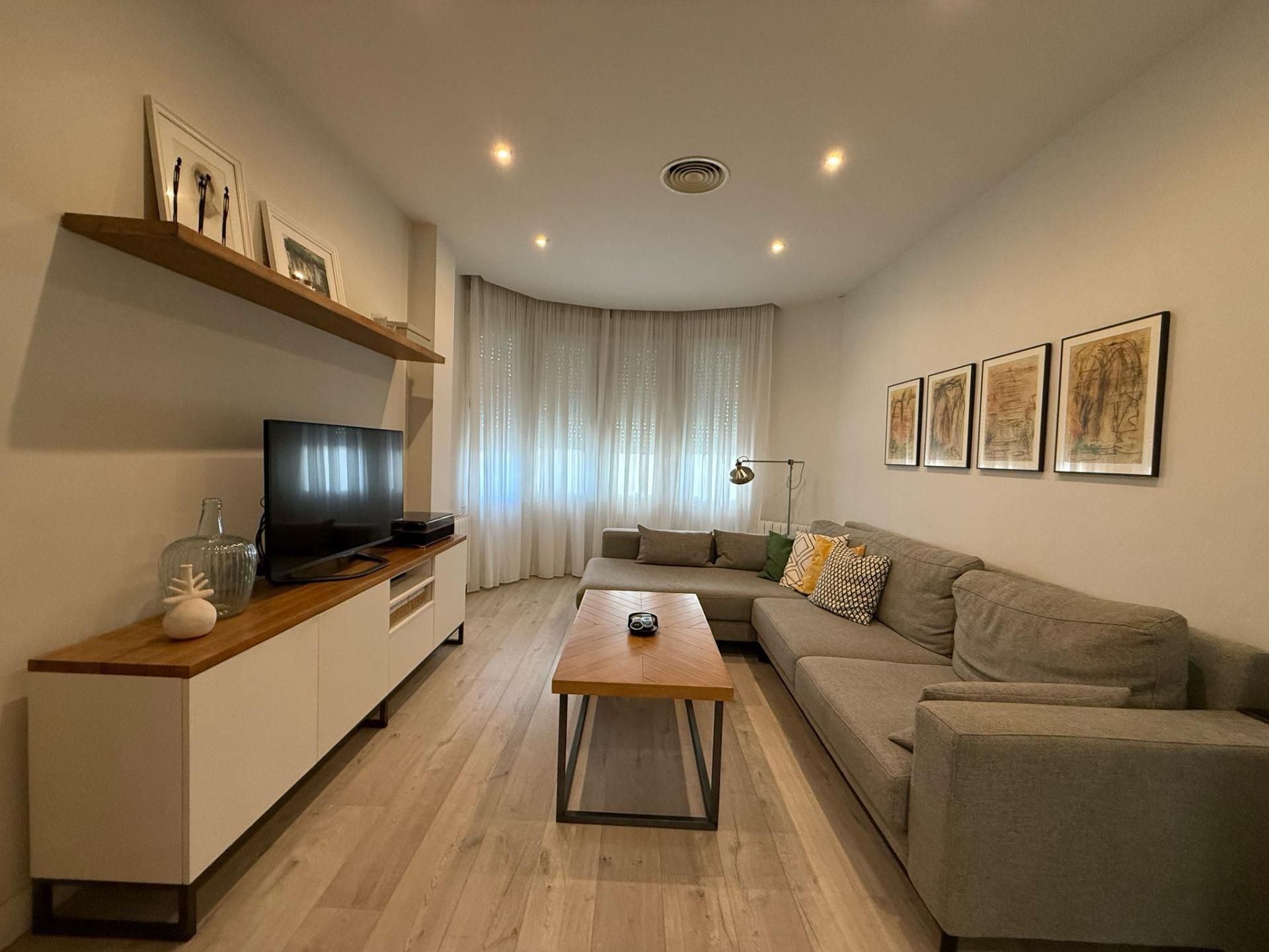Sala de estar de Casa adosada en venta en Gines con Aire acondicionado y Parquet