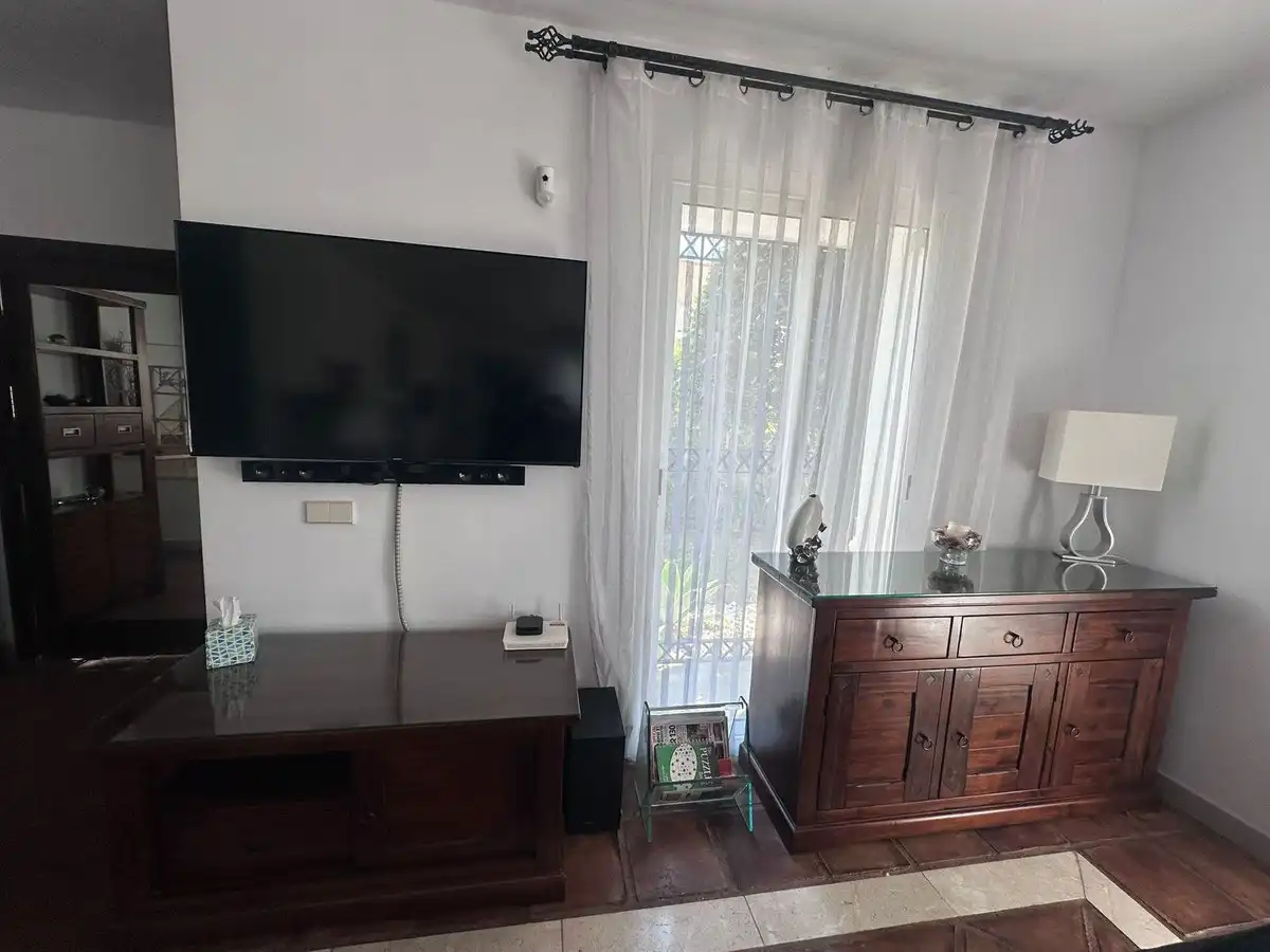 Sala de estar de Casa o chalet en venta en Manilva con Aire acondicionado, Jardín privado y Terraza
