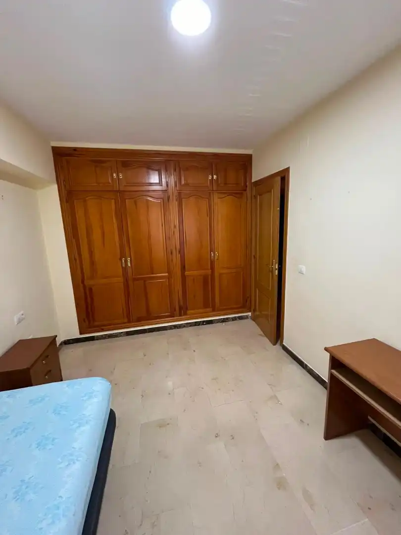 Dormitori de Casa adosada de lloguer en Málaga amb Aire condicionat, Terrassa i Moblat