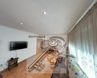 Living room of Single-family semi-detached for sale in Manuel  with Air Conditioner, Terrace and Storage room