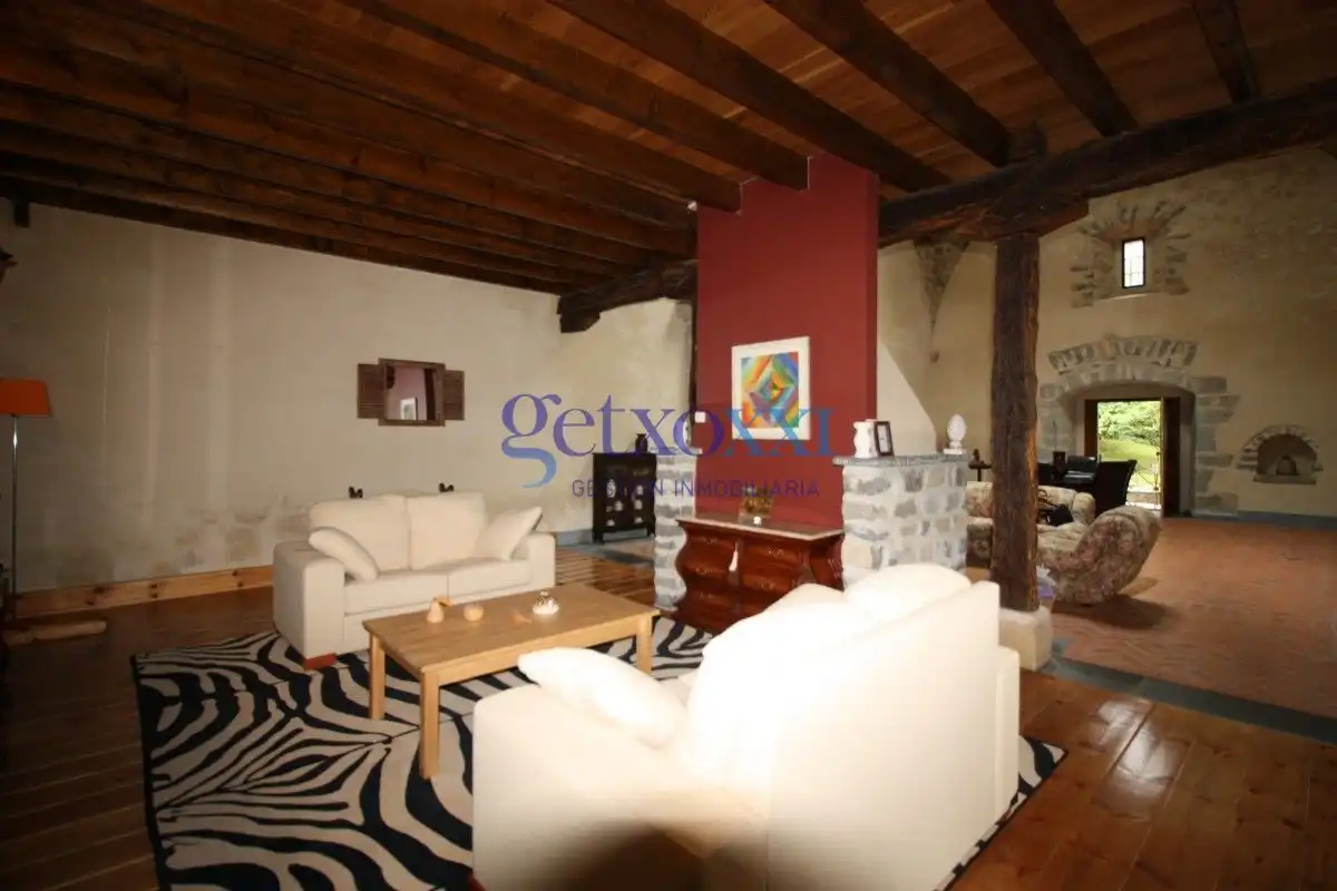 Sala d'estar de Finca rústica en venda en Entrambasaguas amb Calefacció, Jardí privat i Terrassa