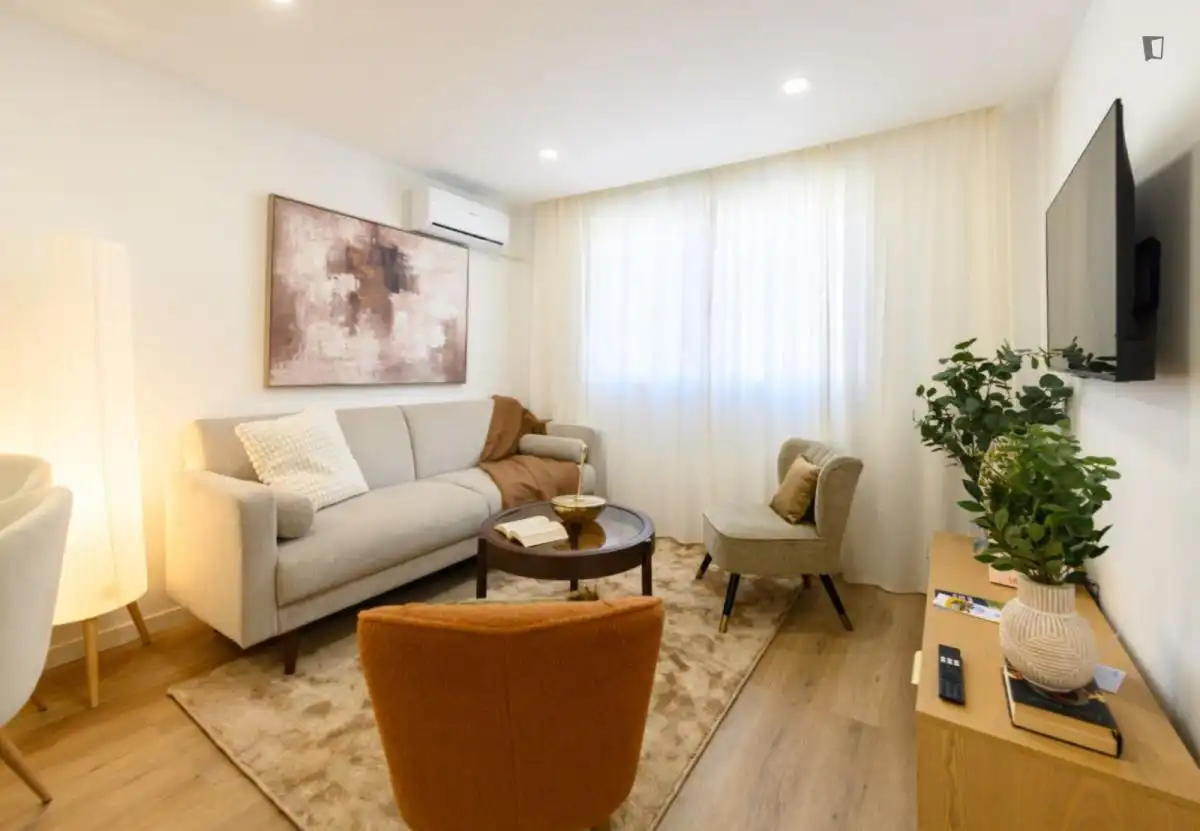 Sala de estar de Apartamento de alquiler en Madrid con Aire acondicionado, Calefacción y Amueblado