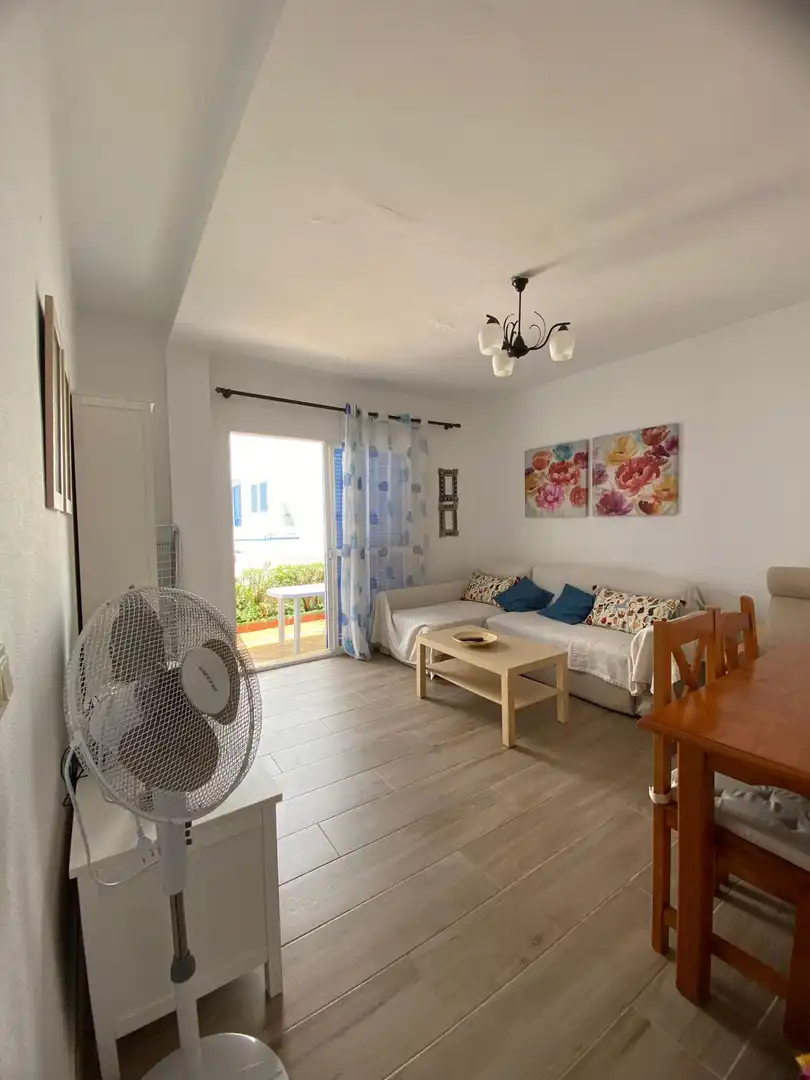 Wohnzimmer von Wohnungen zur Miete in Chiclana de la Frontera mit Privatgarten, Abstellraum und Gemeinschaftspool