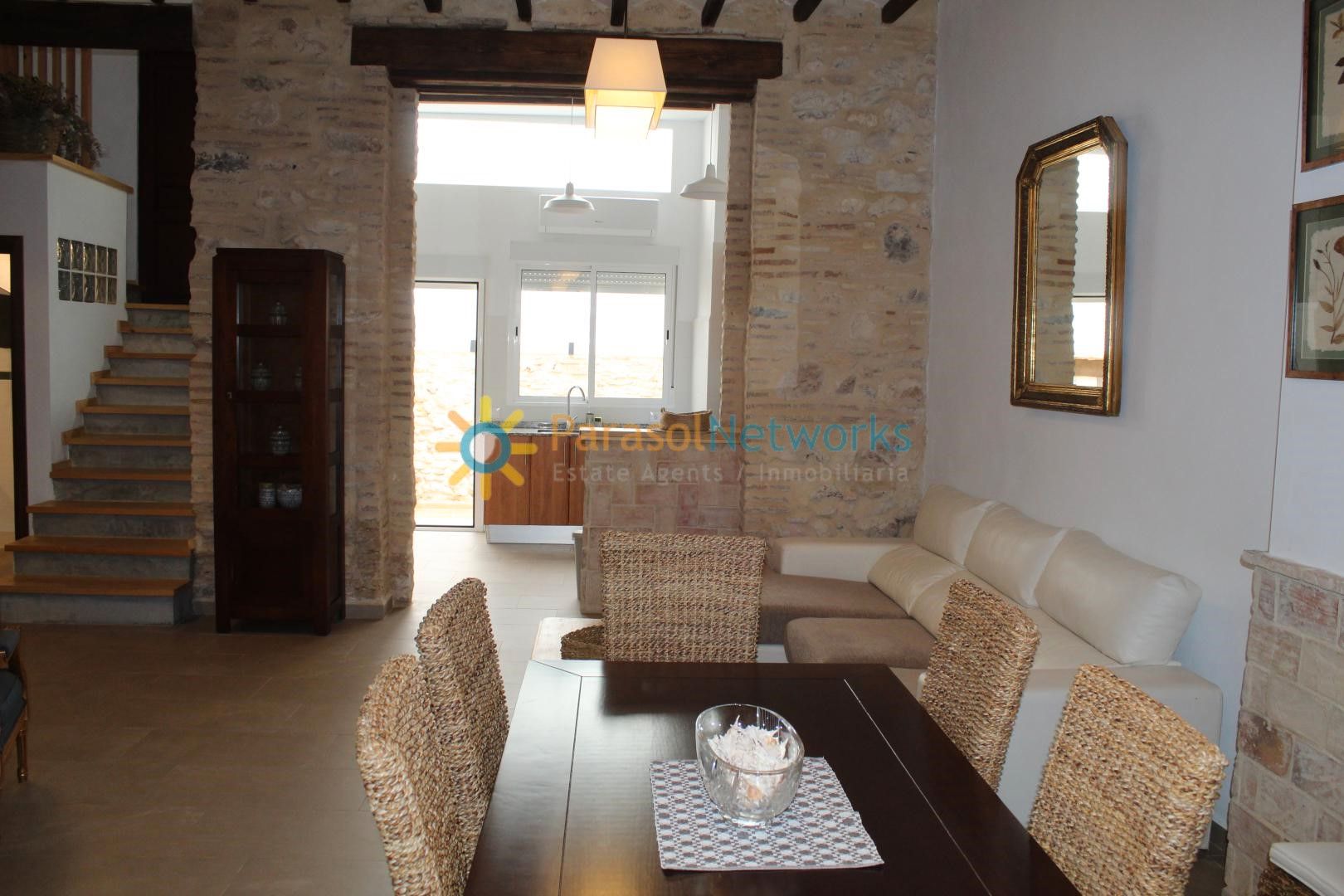 Sala de estar de Casa adosada de alquiler en La Font d'en Carròs con Aire acondicionado, Terraza y Trastero