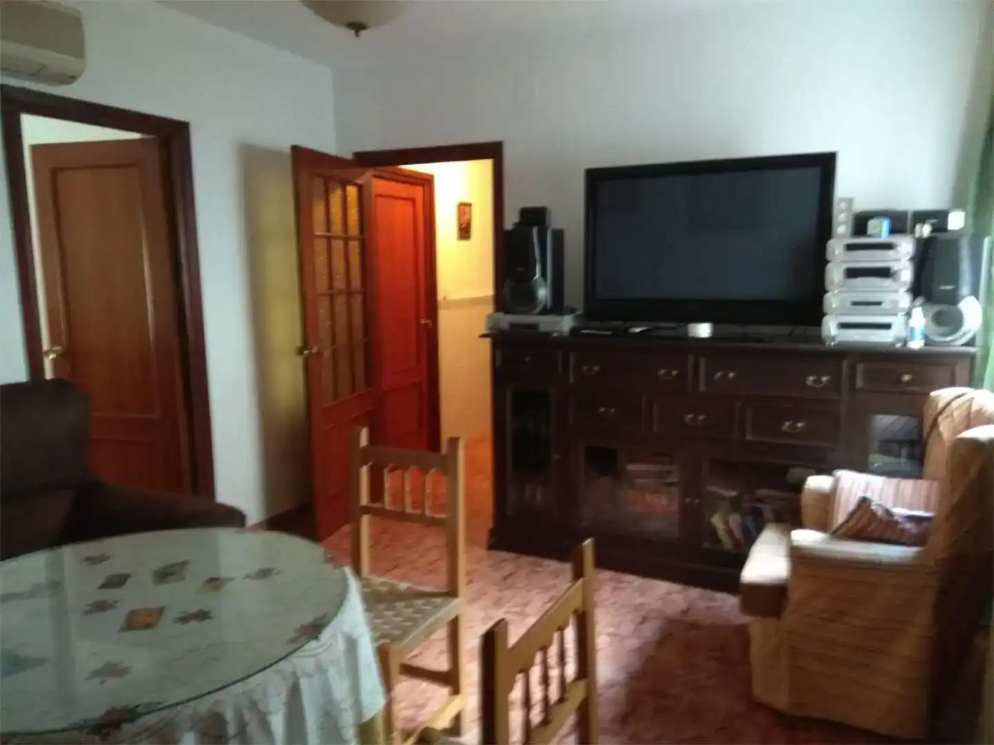 Sala d'estar de Casa adosada en venda en Arjonilla amb Aire condicionat, Traster i Balcó
