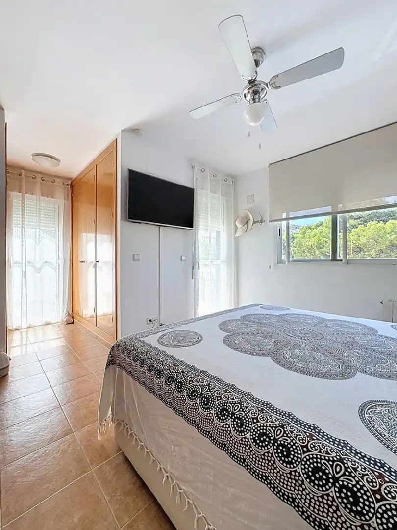 Dormitori de Casa adosada en venda en L'Alfàs del Pi amb Aire condicionat, Jardí privat i Terrassa