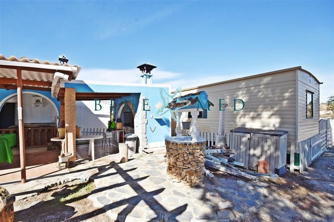 Vista exterior de Casa o xalet en venda en Mazarrón amb Jardí privat, Piscina i Moblat