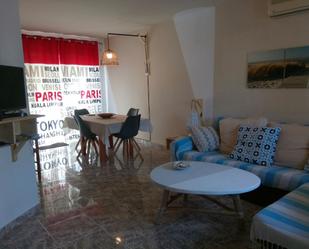 Sala d'estar de Apartament de lloguer en Cunit amb Aire condicionat i Terrassa