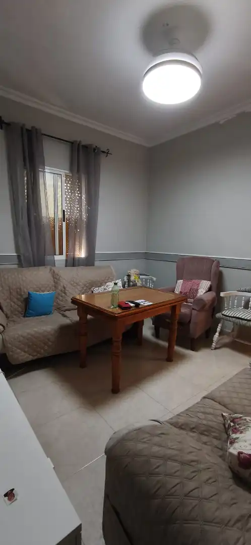 Sala d'estar de Casa o xalet en venda en Sevilla amb Aire condicionat, Terrassa i Moblat