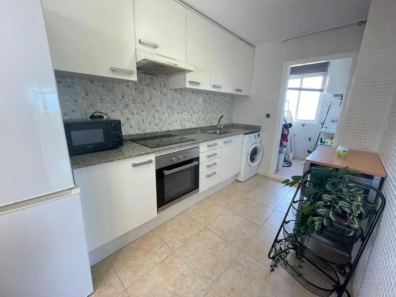 Cuina de Apartament en venda en La Manga del Mar Menor amb Aire condicionat, Terrassa i Piscina