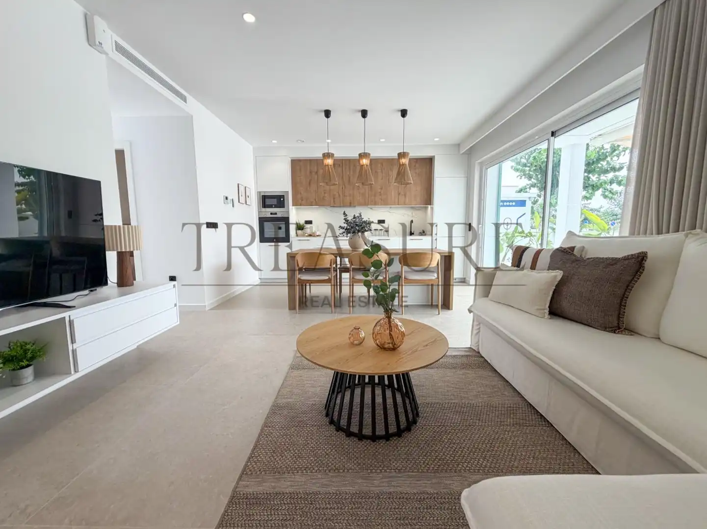 Sala d'estar de Planta baixa en venda en Pilar de la Horadada amb Aire condicionat, Jardí privat i Terrassa